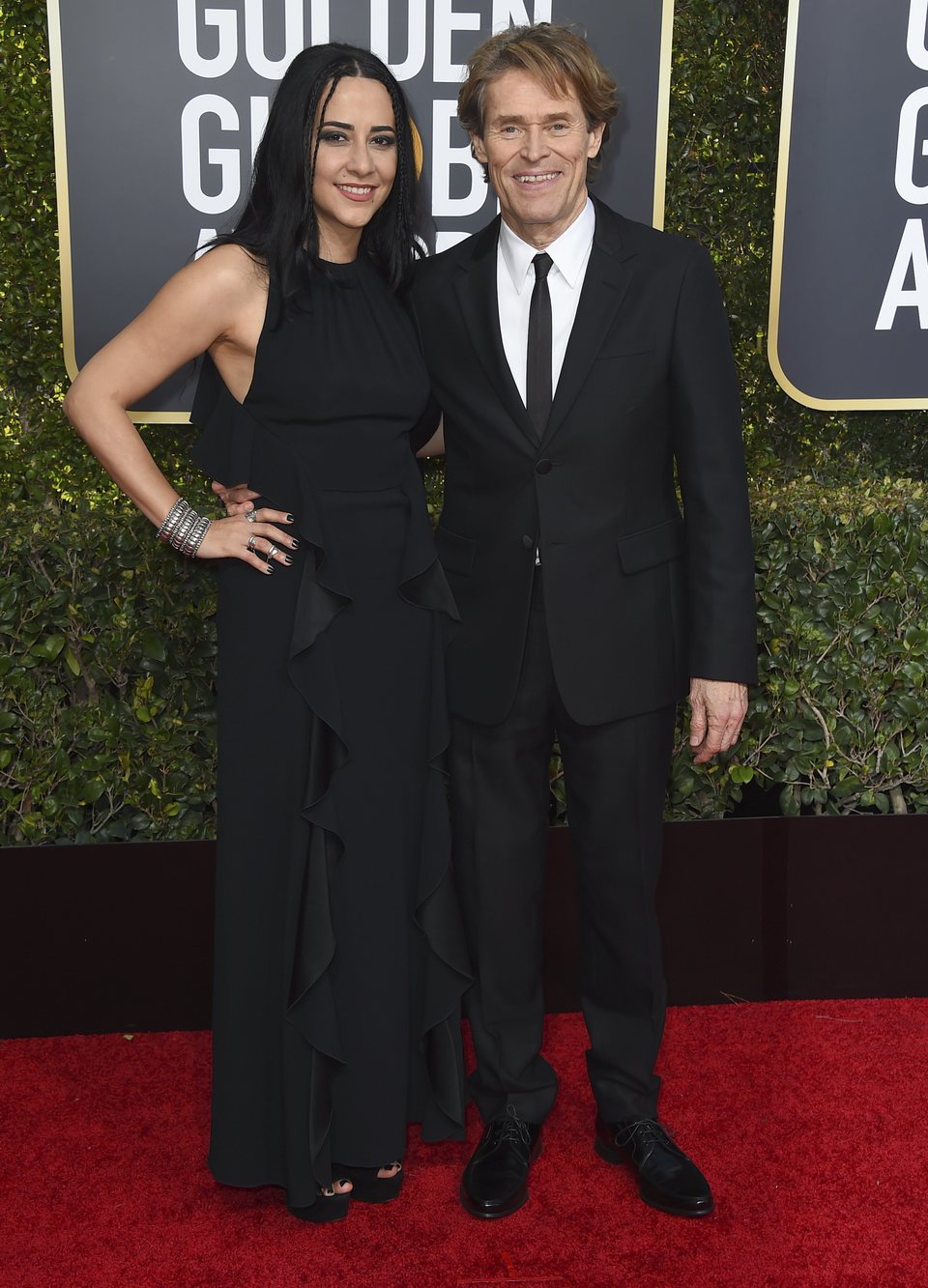 Willem Dafoe and Giada Colagrande  on the red carpet at the Golden Globes 2019