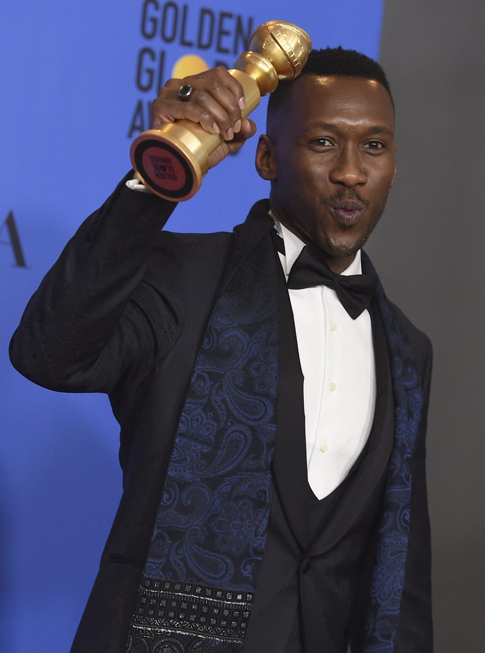 Mahershala Ali poses with his Golden Globe