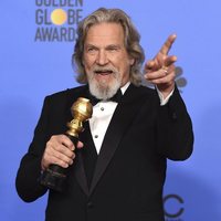 Jeff Bridges poses with his Cecil B. DeMille Award