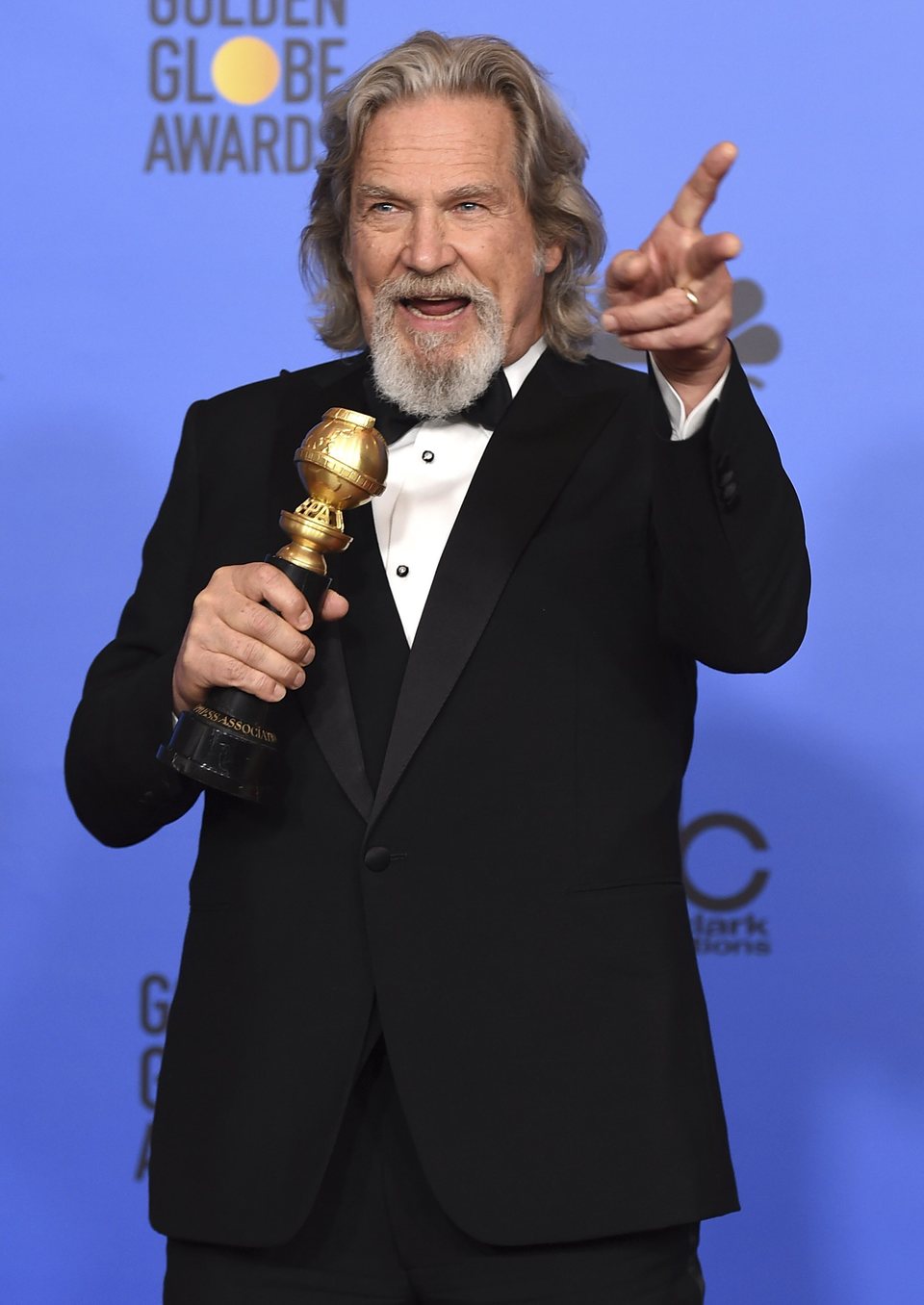 Jeff Bridges poses with his Cecil B. DeMille Award