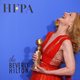 Patricia Clarkson poses with her Golden Globe