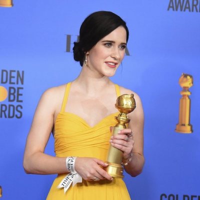 Rachel Brosnahan poses with her Golden Globe