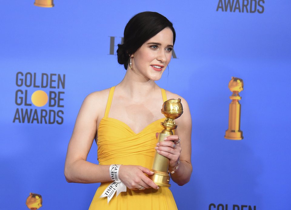 Rachel Brosnahan poses with her Golden Globe