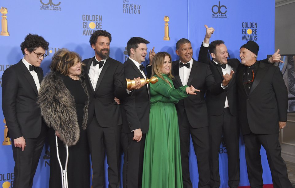 The crew of 'Spider-Man: Into the Spider-Verse' poses with their Golden Globe