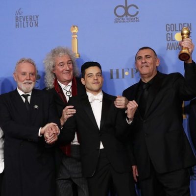 The cast of 'Bohemian Rhapsody' poses with its two Golnden Globes