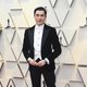 Henry Golding on the red carpet at the 2019 Oscars