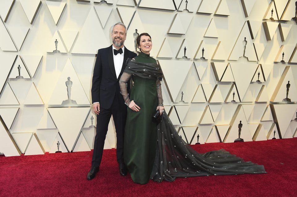 Olivia Colman and Ed Sinclair on the red carpet at the Oscars 2019