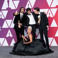 Oscar winners for Best Original Song for 'Shallow' pose with their Oscars