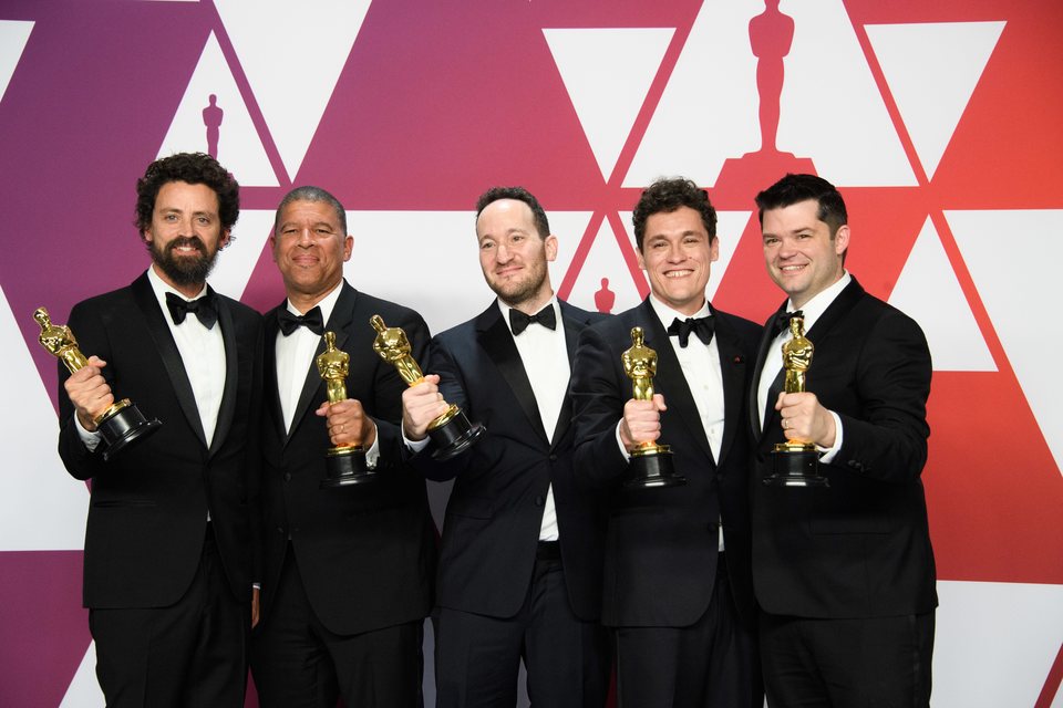 Oscar winners for Best Animated Feature Film for 'Spider-Man: Into the Spider-Verse' pose with their Oscars