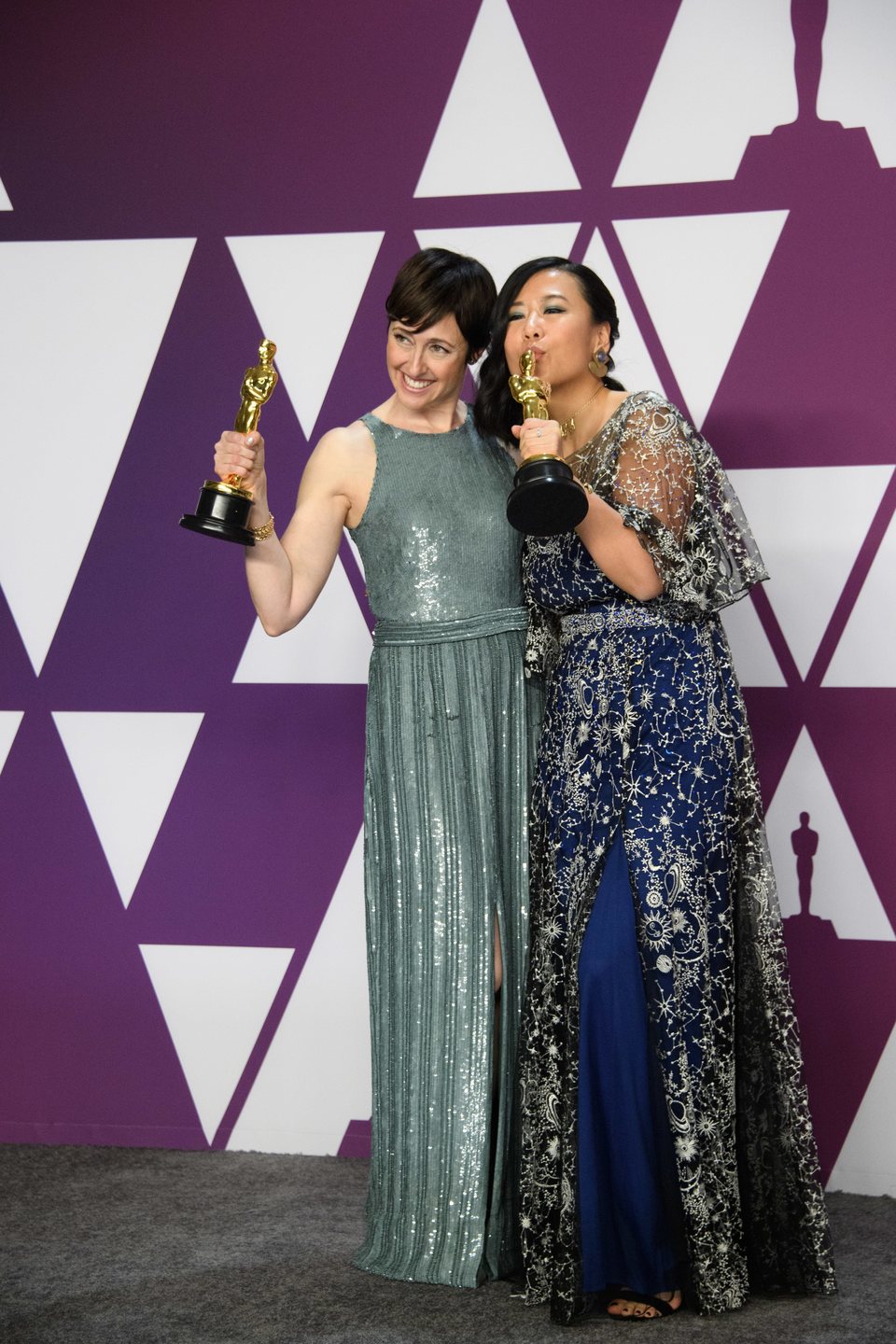 Oscar winners for Best Animated Short Film pose with their Oscars