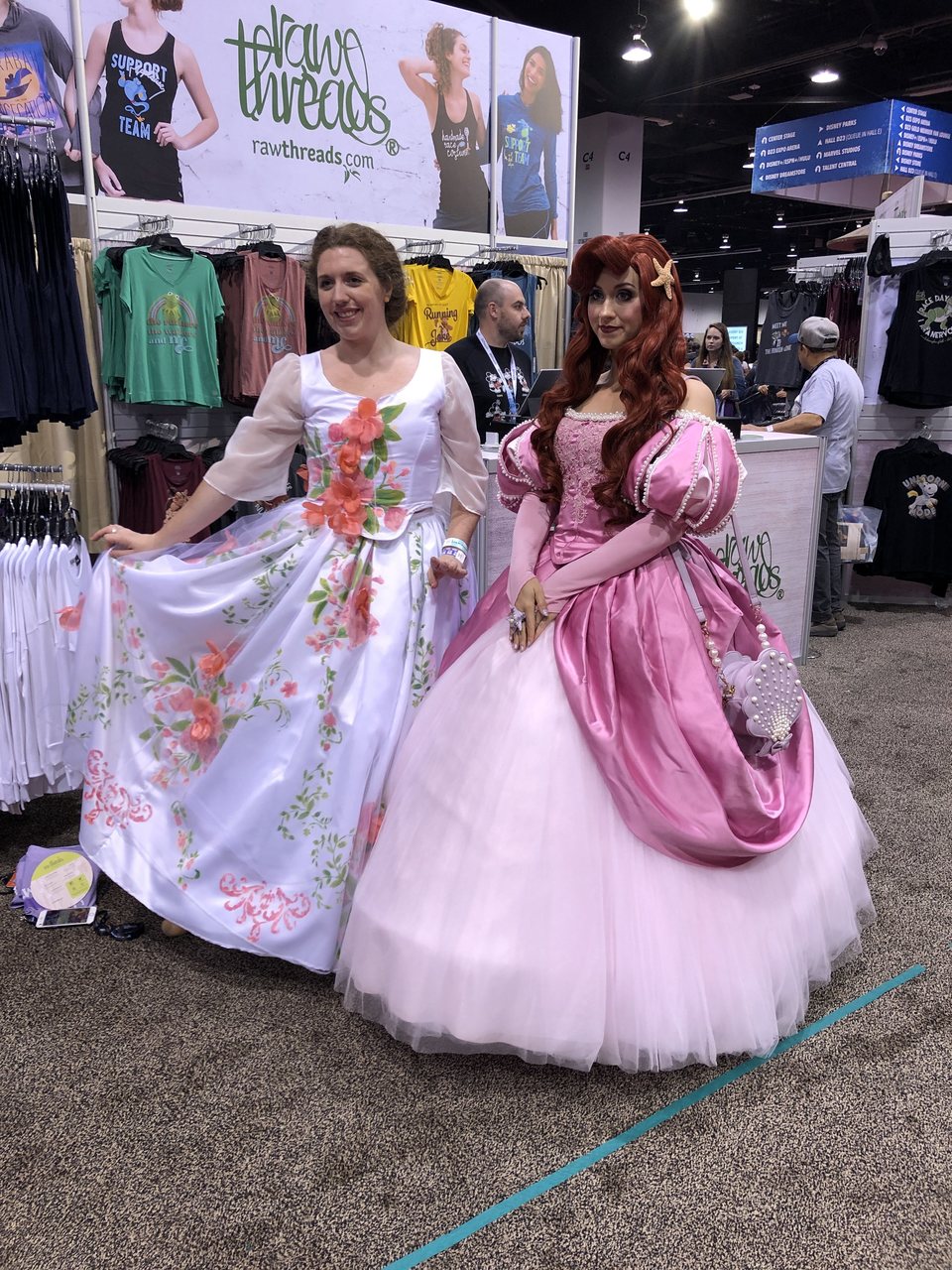 Fans dressed up as Belle and Ariel, from 'Beauty and the Beast' and 'The Little Mermaid'