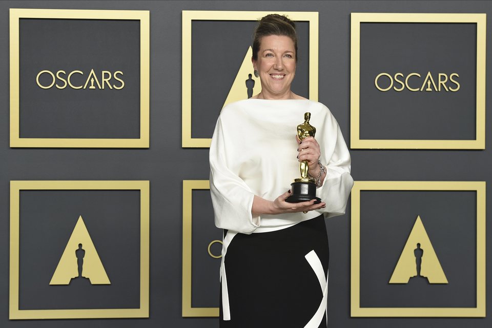 Jacqueline Durran with her Oscar Award for Best Achievement in Costume Design