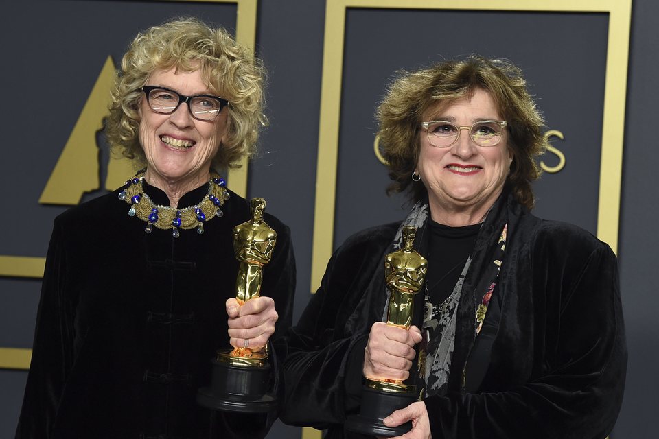 Nancy Haigh and Barbara Ling with their Oscar to Best Production Design for 'Once Upon a Time... in Hollywood'