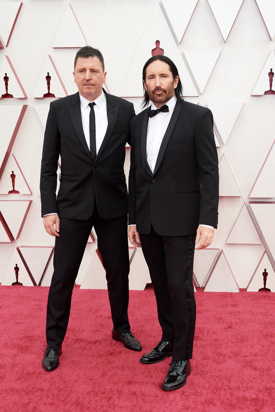 Atticus Ross and Trent Reznor at the Oscars 2021 red carpet