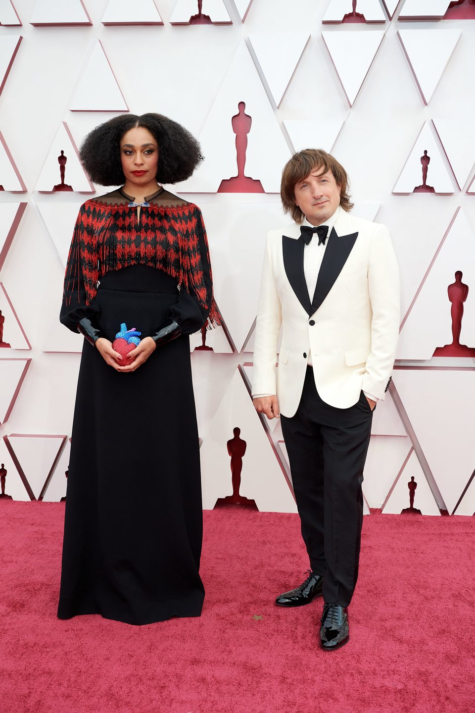 Celeste Waite and Daniel Pemberton at the Oscars 2021 red carpet