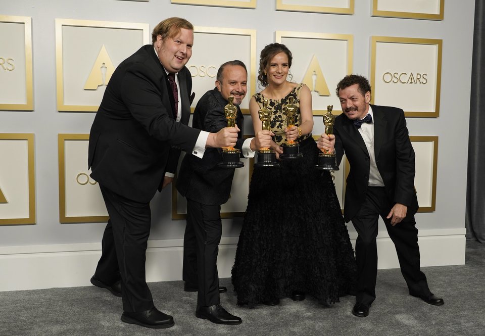 Phillip Bladh, Carlos Cortes, Michellee Couttolenc and Jaime Baksht, Oscar 2021 winners for best sound