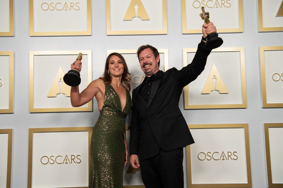 Pippa Erlich and James Reed winners of Best Documentary Feature 2021 Oscar