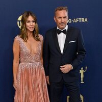 Christine Baumgartner and Kevin Costner at the Screen Actors Guild Awards 2022