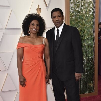 Denzel Washington and Pauletta Washington at the Oscars 2022 red carpet