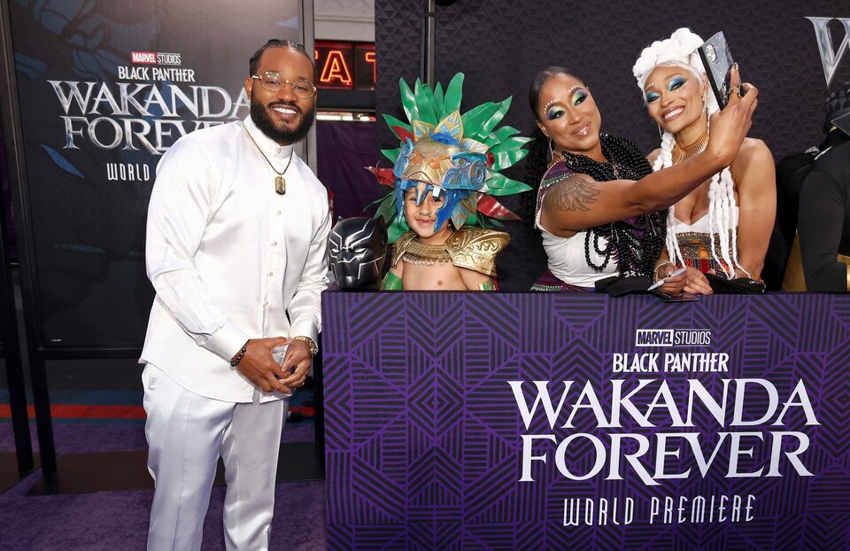 Ryan Coogler poses with fans at the 'Black Panther: Wakanda Forever' premiere