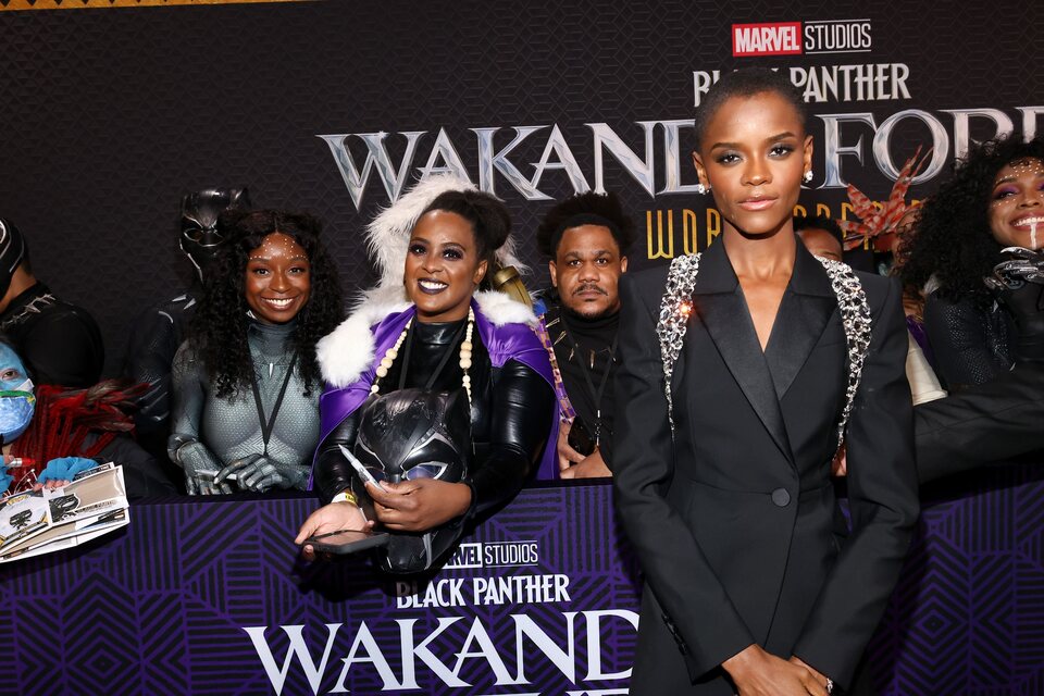 Letitia Wright poses with fans at the 'Black Panther: Wakanda Forever' premiere