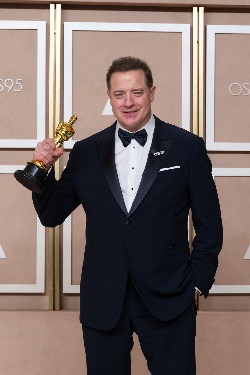 Brendan Fraser poses with his Oscar as leading actor