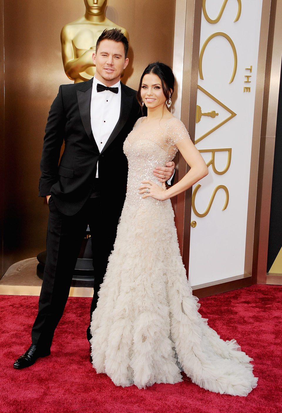 Channing Tatum and Jenna Dewan-Tatum on the red carpet at the 2014 Oscars