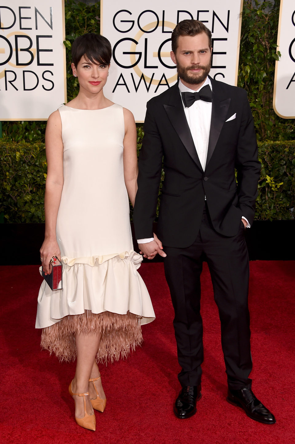 Jamie Dornan and Amelia Warner at the Golden Globes 2015 red carpet