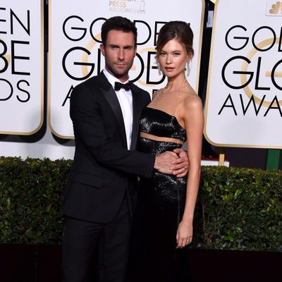 Adam Levine and Behati Prinsloo at the Golden Globes 2015 red carpet