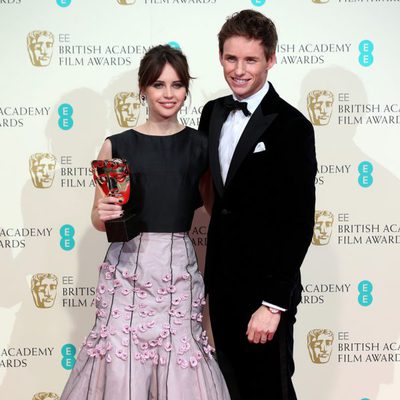 Felicity Jones and Eddie Redmayne poss with the Outstanding British Film Award for the 'Theory of Everything' at the BAFTA 2015