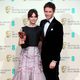 Felicity Jones and Eddie Redmayne poss with the Outstanding British Film Award for the 'Theory of Everything' at the BAFTA 2015