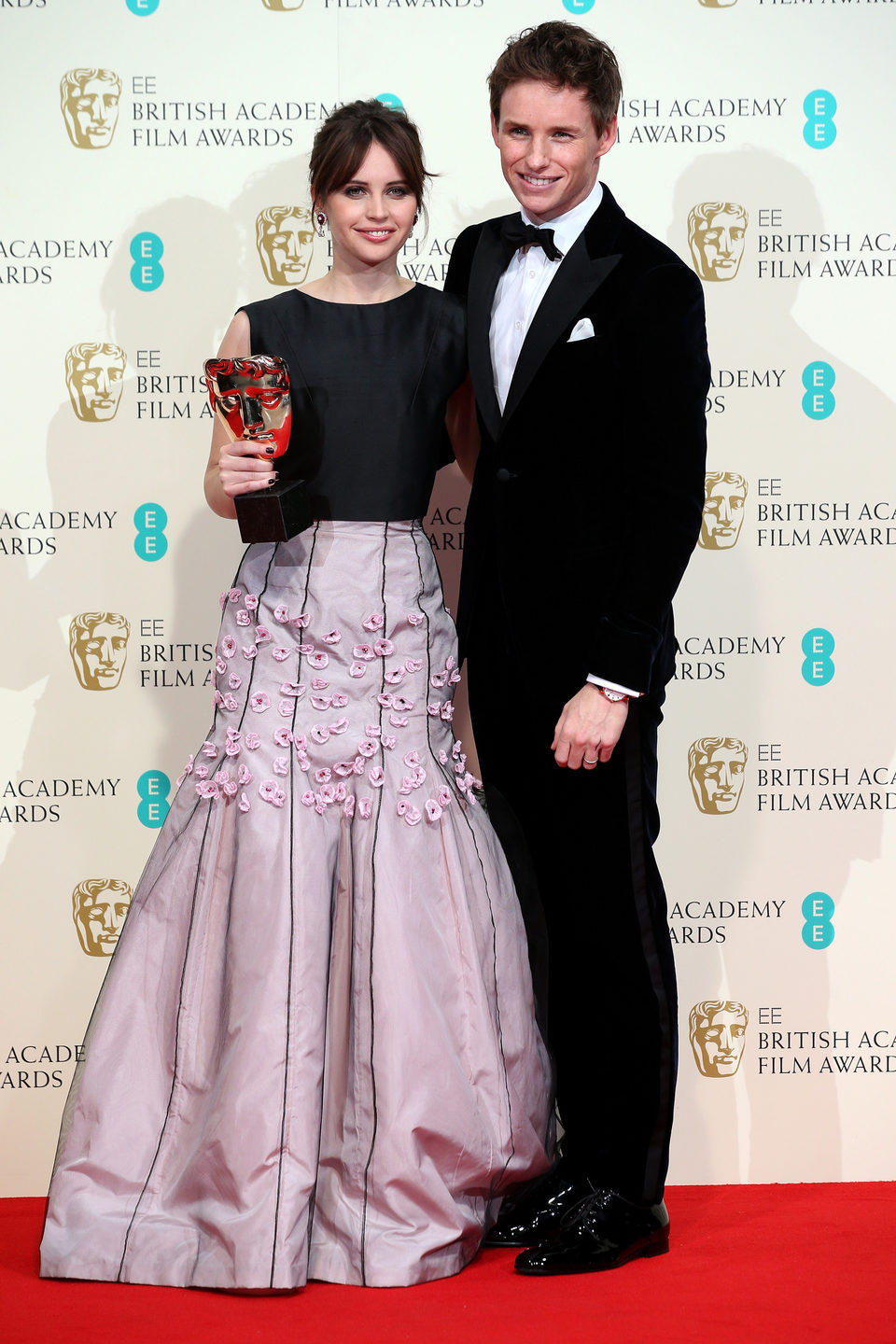 Felicity Jones and Eddie Redmayne poss with the Outstanding British Film Award for the 'Theory of Everything' at the BAFTA 2015