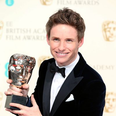 Eddie Redmayne posses with best actor award at the BAFTA 2015