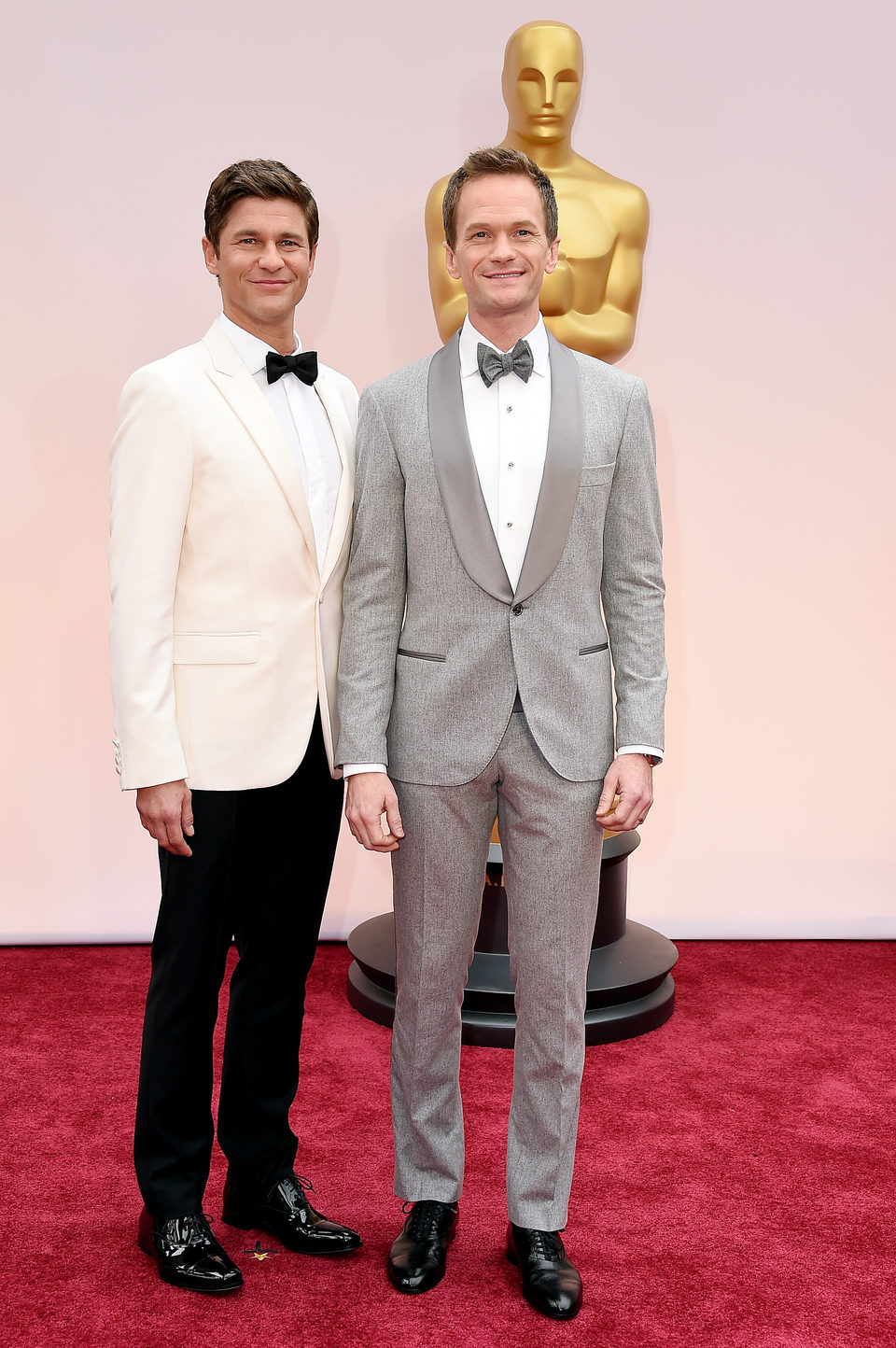 Neil Patrick Harris with his husband David Burtka in the red carpet of the Oscar 2015