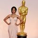 Zoe Saldana poses at the red carpet of the Oscar 2015