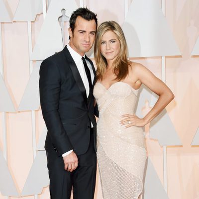 Jennifer Aniston and her fiancé Justin Theroux at the red carpet of the Oscar 2015