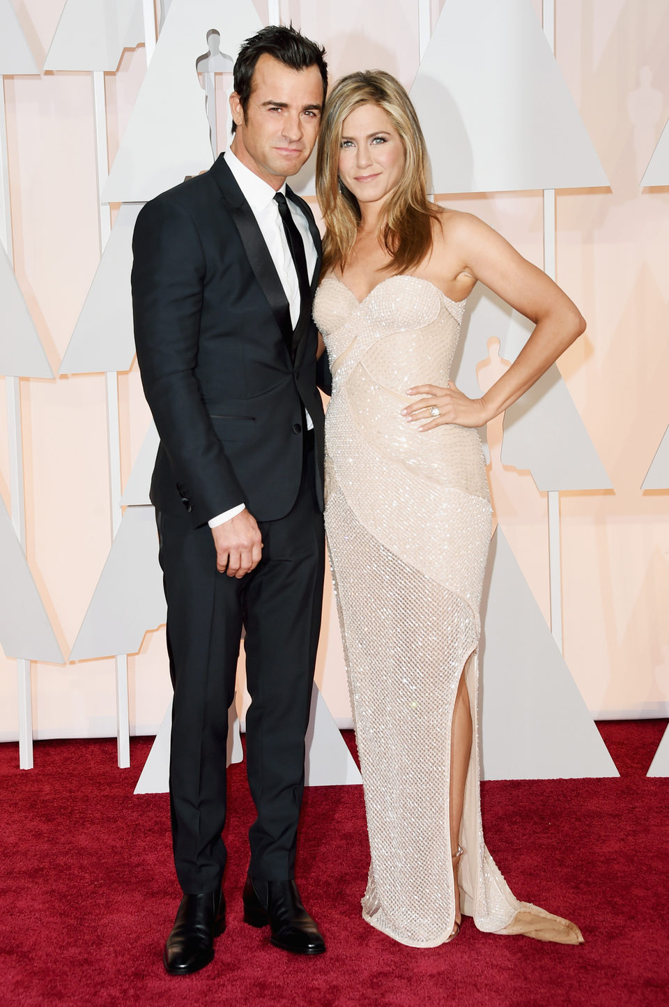 Jennifer Aniston and her fiancé Justin Theroux at the red carpet of the Oscar 2015