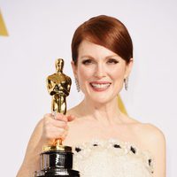 Julianne Moore poses with her Best Actress Oscar Award