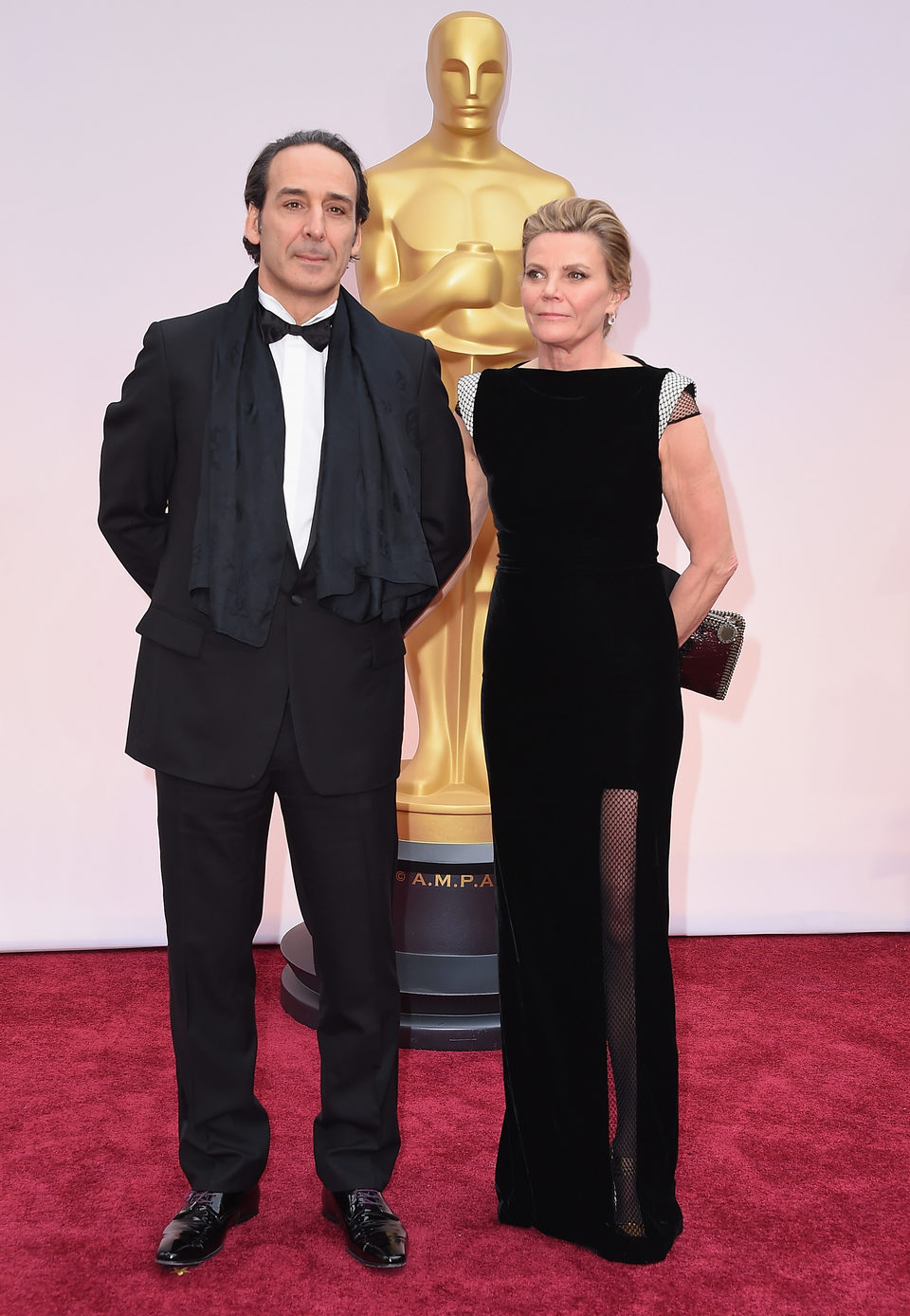 Alexandre Desplat and Dominique Lemonier in the Oscar 2015 red carpet