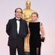 Alexandre Desplat and Dominique Lemonier in the Oscar 2015 red carpet