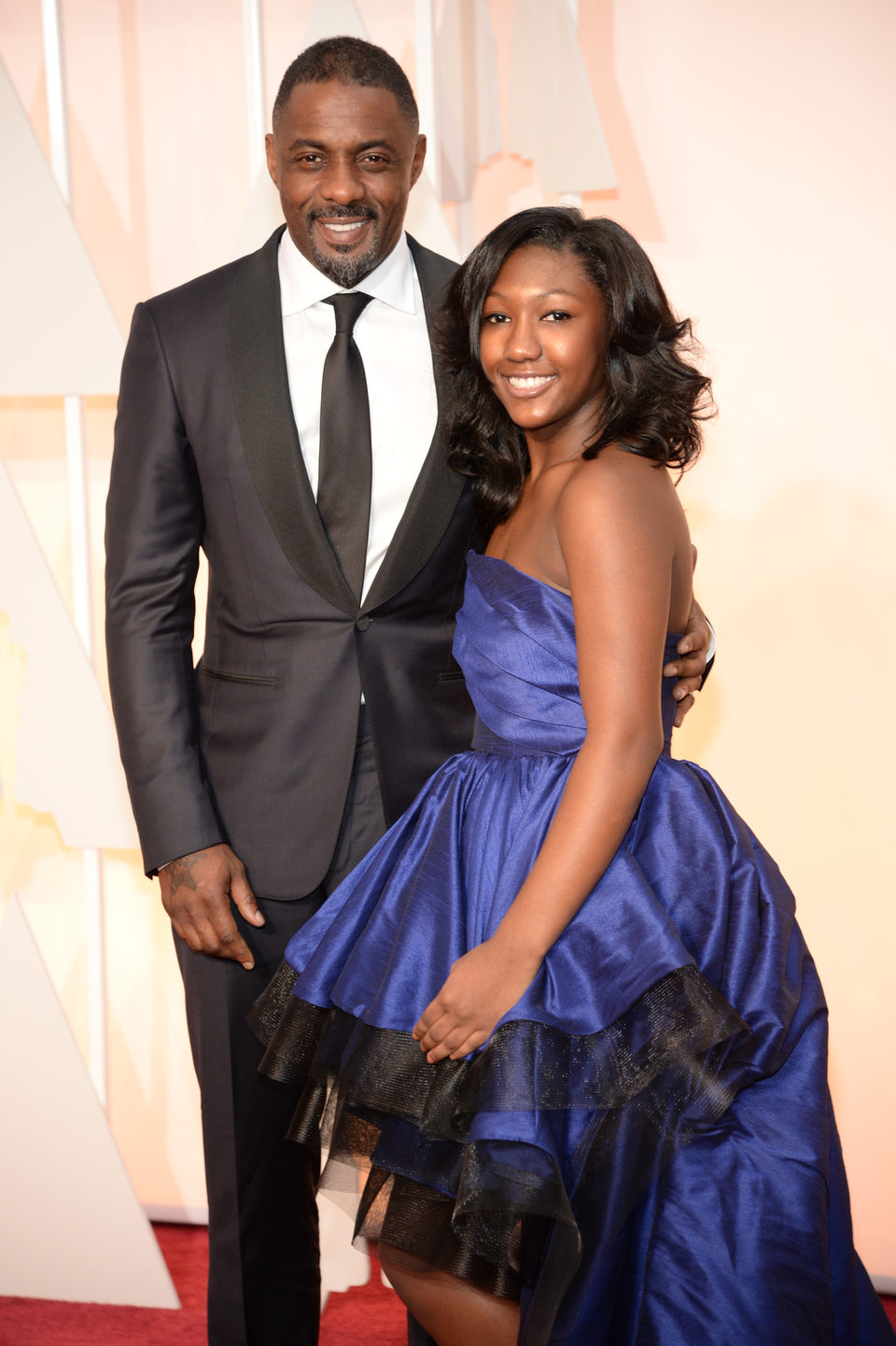 Idris Elba and his daughter in the Oscar 2015 red carpet