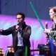 J.J. Abrams and Kathleen Kennedy with lightsabers at the Comic-Con 2015