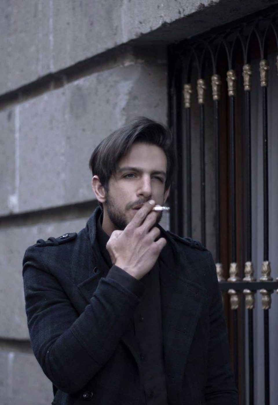 Joaquín Ferreira smoking on the street