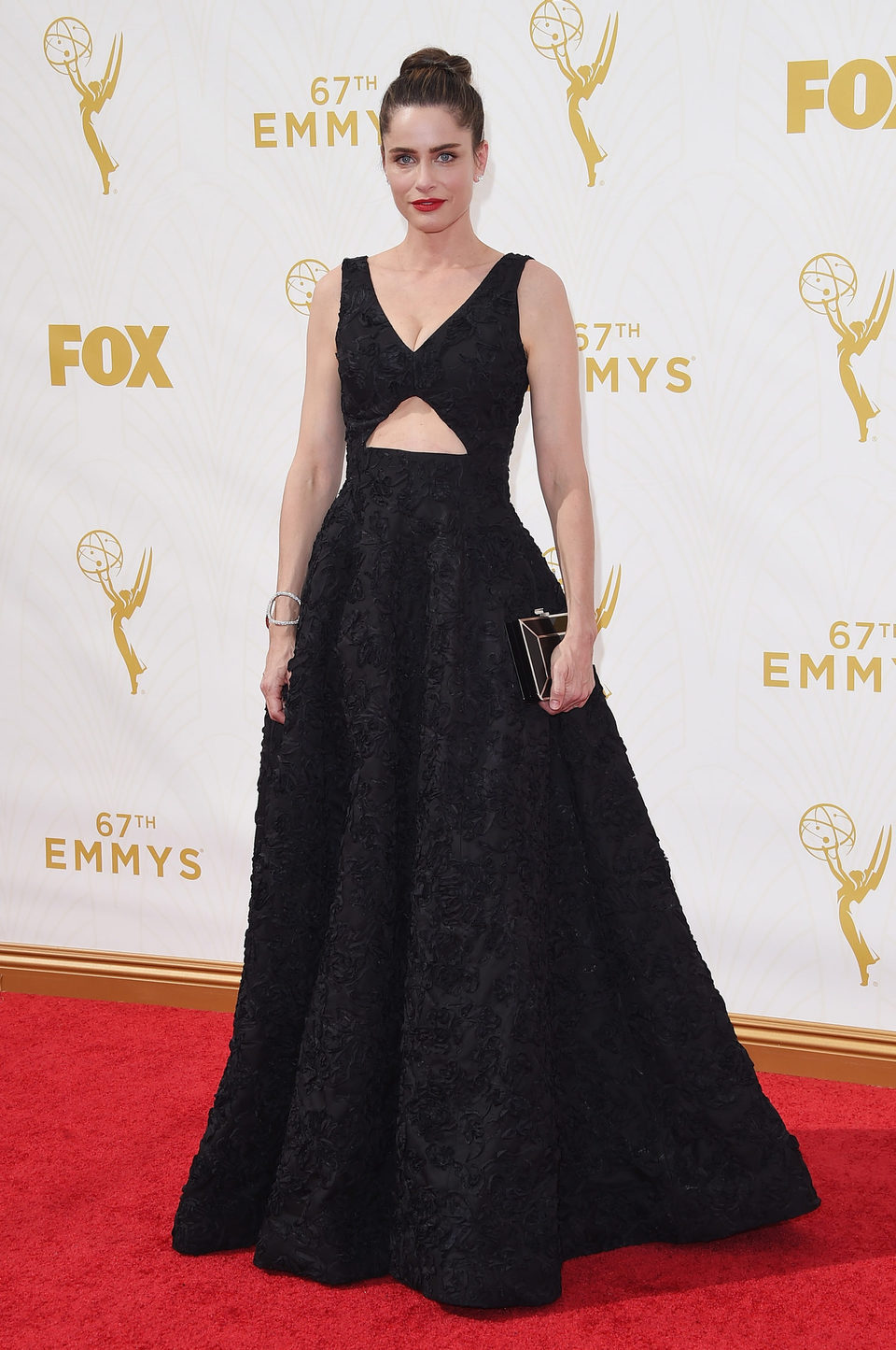 Amanda Peet at the red carpet at the 2015 Emmy Awards