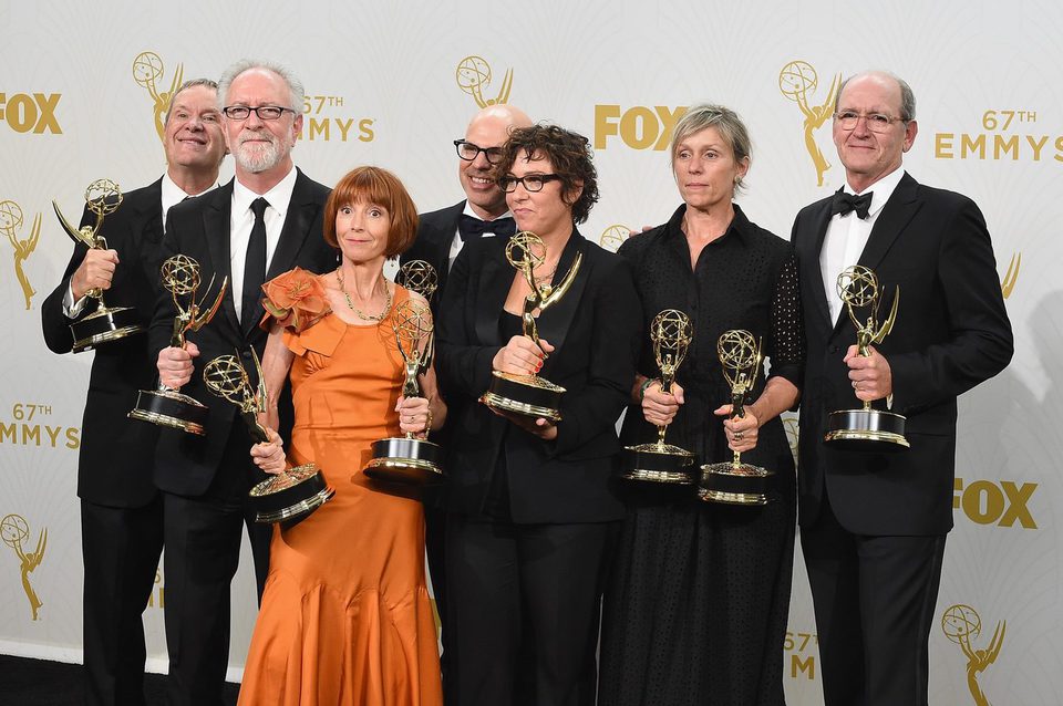 The 'Olive Kitteridge' team posing with their 2015 Emmy Awards