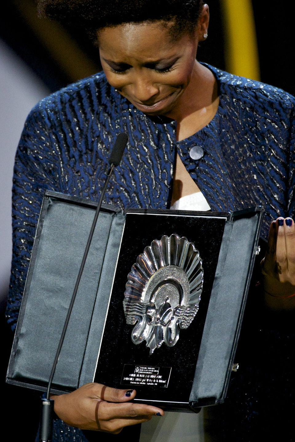 Yordanka Ariosa receives the Silver Shell for Best Actress for the film 'El rey de la Habana (The King of Havana)' during the closing ceremony red carpet o