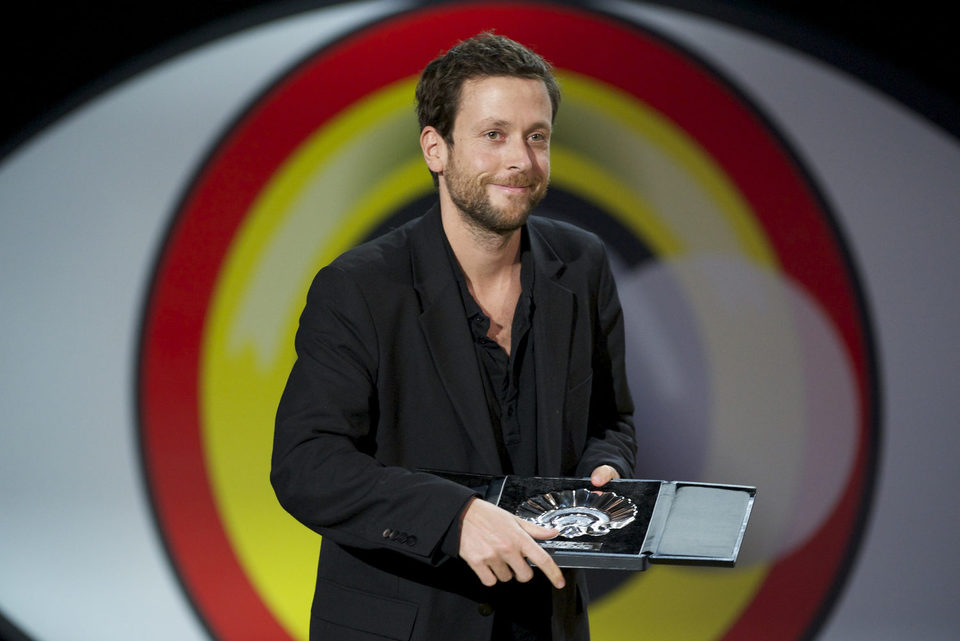 Joachim Lafosse receives the Silver Shell for Best Director for the film 'Les Chevaliers Blancs (The White Knights)' during the closing ceremony of 63rd Sa