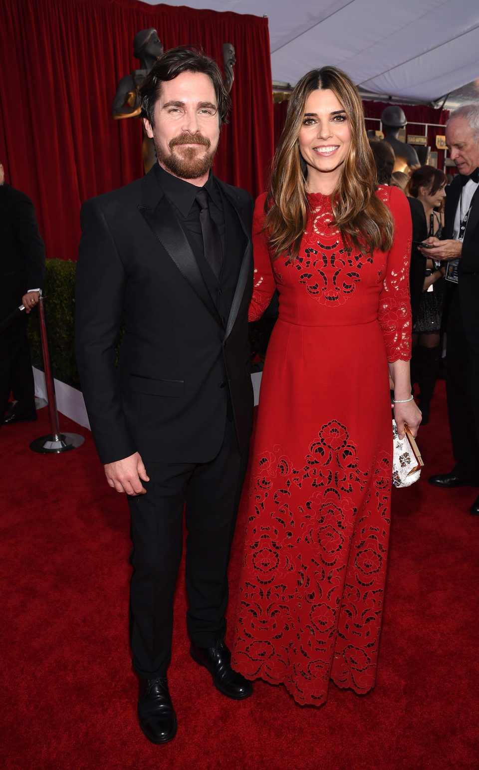 Christian Bale and Sibi Blazic in red carpet of SAG Awards 2016.