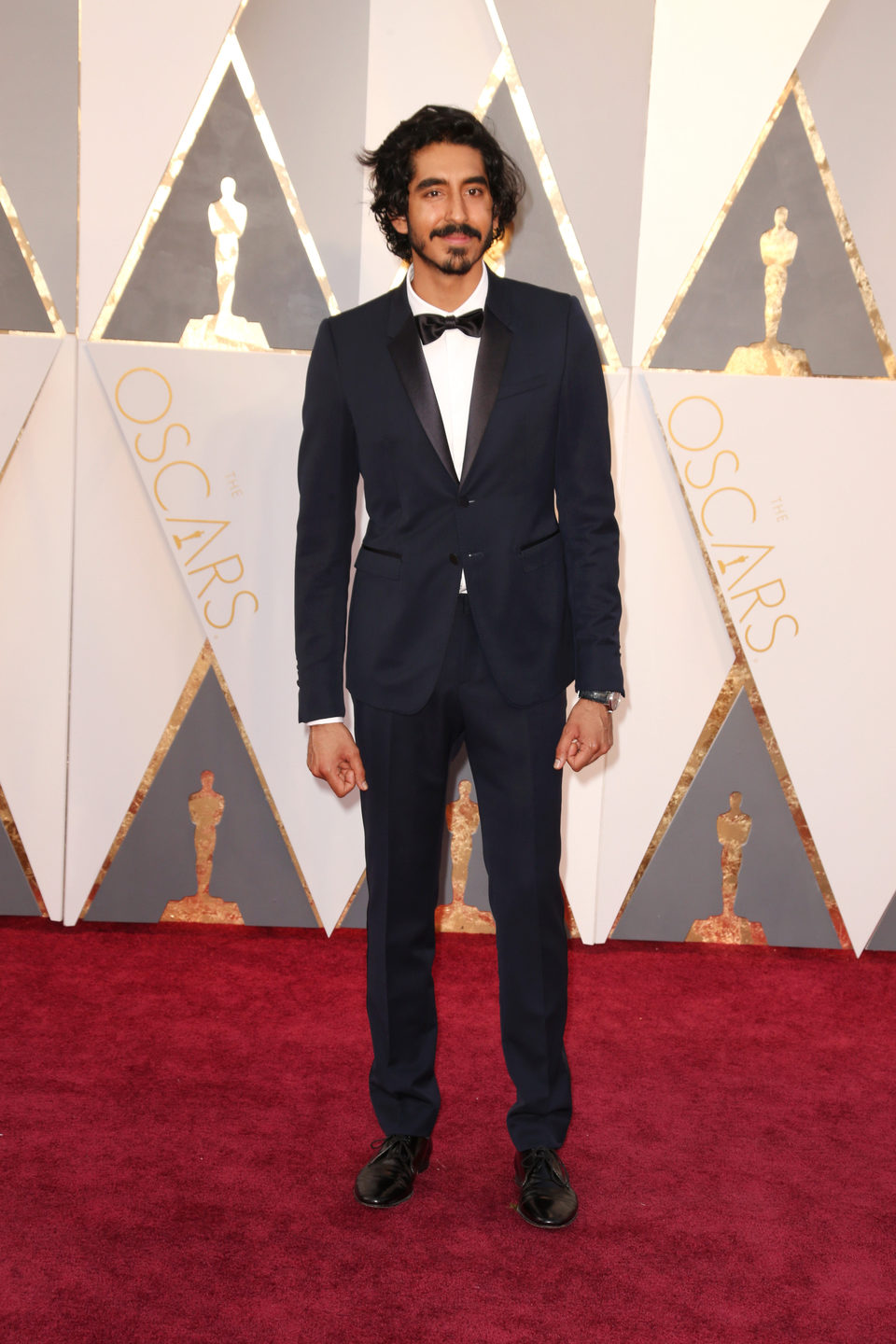 Dev Patel at the Oscars 2016 red carpet