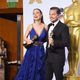 Brie Larson and Leonardo DiCaprio poses with their Oscar